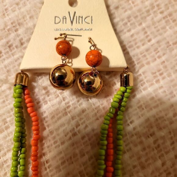 A beaded necklace  with a cross attached with leather Swarovski blue crystal - Picture 3 of 5